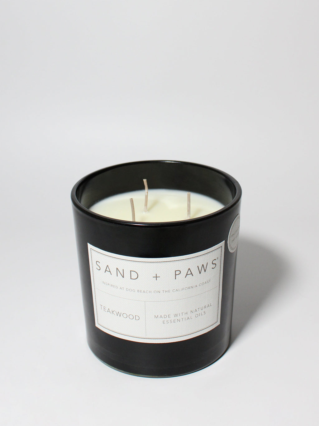 Luxurious Sand + Paws Teakwood 21 oz scented candle